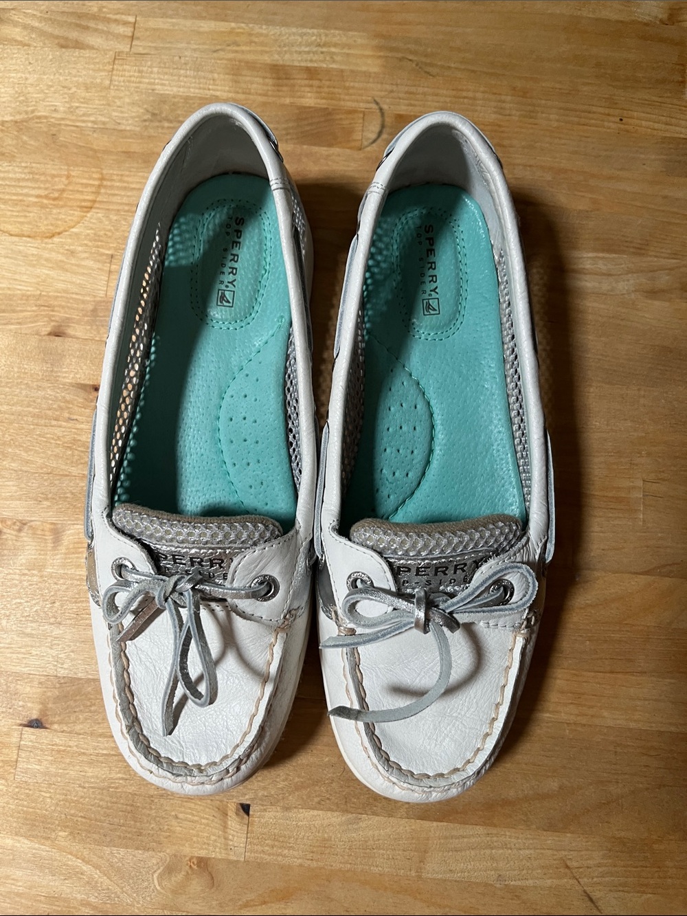 Sperry Women's White with silver. Leather Moccasin Flats with Seafoam Insole